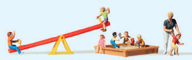 Spielende Kinder. Wippe, Sandkasten