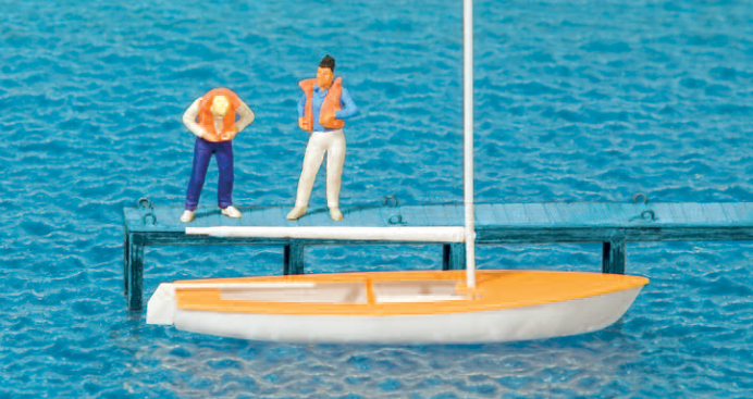 Segler, Weste anlegend. Segelboot "Korsar"