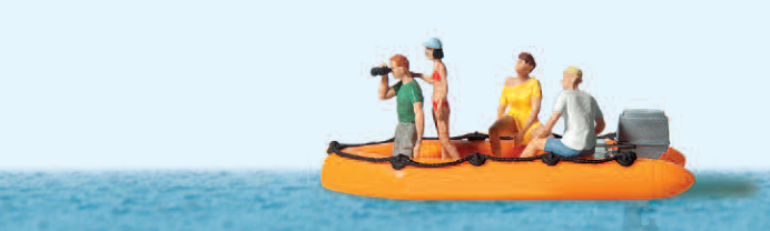 Familie im Schlauchboot