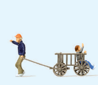 Kinder mit Bollerwagen