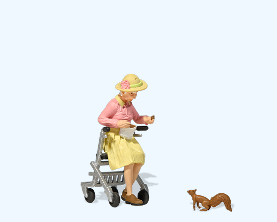 Alte Dame mit Rollator, Eichhörnchen fütternd