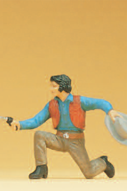 Cowboy kniend, mit Revolver