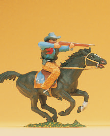 Cowboy reitend, mit Gewehr